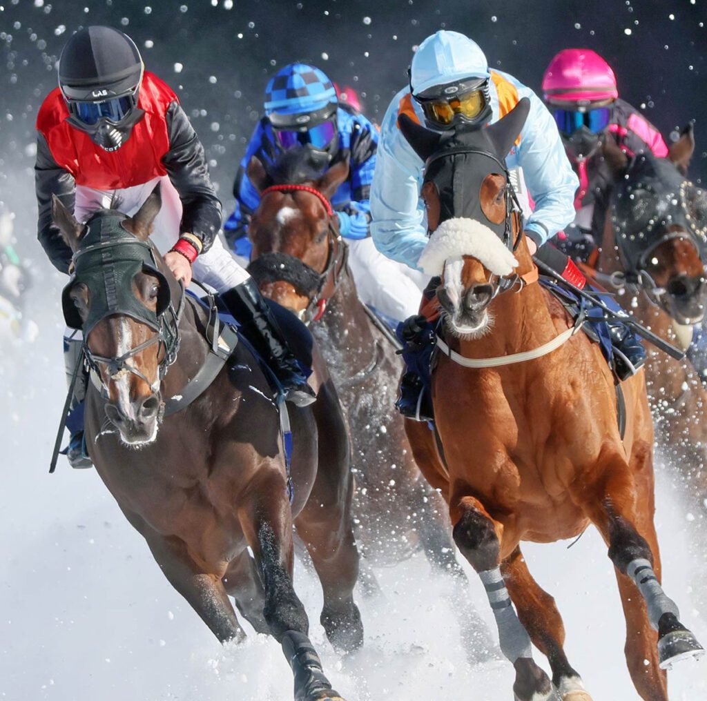 Horses racing on the White Turf Racing Days St. Moritz