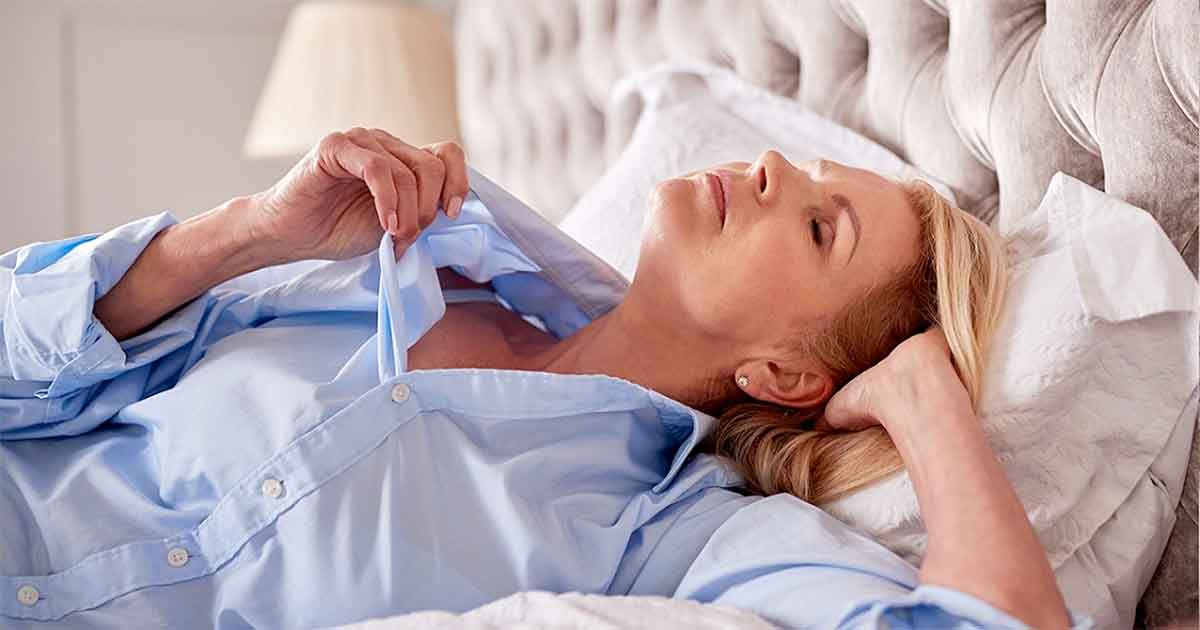 Woman in bed premenopause