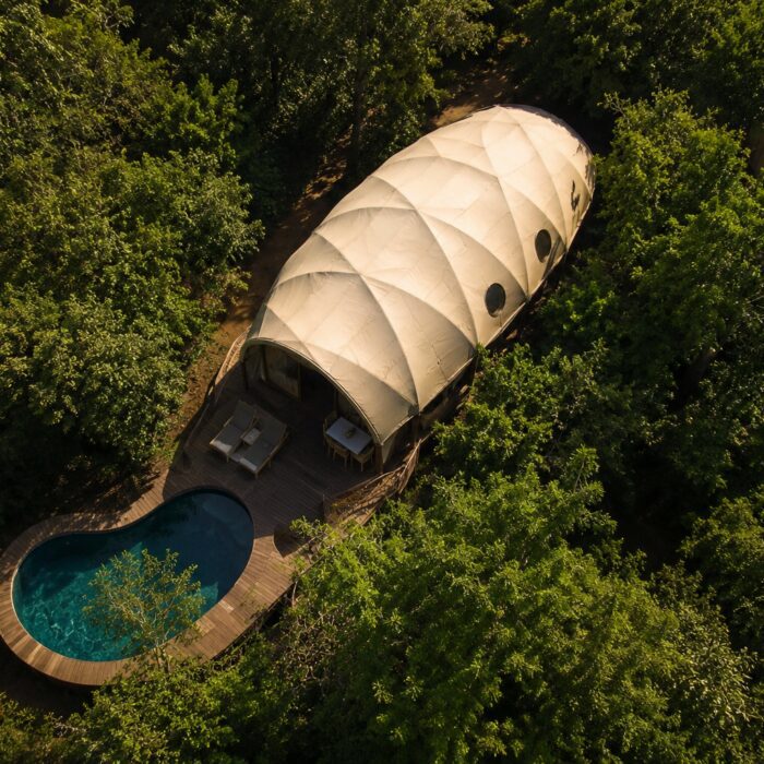 Aerial view of Wild Coast Tented Lodge Sri Lanka tented suite surrounded by jungle